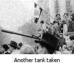Hungarian's celebrate on captured Soviet tank