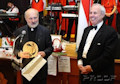 The formal part of the evening was concluded by the presentation of awards for service to the Hungarian and the American Hungarian communities. Seen here is Father Ivan Csete for his efforts in visiting rural parishioners and caring for the poor in New York with Tom Hilberth