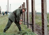 May 2, 1989 - Hungary begins dismantling the "iron curtain" fence marking the border with Austria.