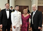 Left to right: Ted Boone, Cmdr. Hargitai, Erika Fedor, Stefan Fedor