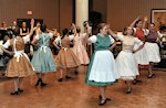 The next part of the program belonged to the scouts who presented “Transdanubian Bottle Dances” (Dunántúli Üveges Tánc) which was choreographed by Zsuzsanna Seres. Performed to music by Muzsikás, the performers (seen here) were Bárczay Sári, Boone Isabelle, Gál Kata, Hargitai Panni, Jámbor Klaudia, Kárpáthy Krisztina, Kölűs Andrea, and McGinn Katie.