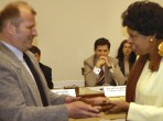 Mayor Illar presents Congresswoman Watson the key to Szelmenc