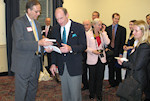 Frank Koszorus presenting award to Congressman Thaddeus McCotter