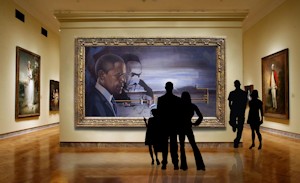 The newest addition to his American Patriotic Series is titled Tribute to Civil Rights. Featuring President Obama and Martin Luther King Jr., this 6’x11’ painting symbolizes the transformation of THE DREAM into REALITY by utilizing both two and three dimensional spaces. The traditional painting technique along with modern composition is carefully joined to touch the spirit of many generations.