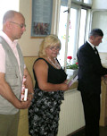 Erika Fedor addressing students, staff and faculty at the Reformed Church's Hungarian Language Elementary School of Vaján (Magyar Tanitási Nyelvü Református Egyházi Alapiskola Vaján)