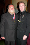 AHF's Professor Peter Hargitai, 2006 recipient of the Col. Commandant Michael Kovats Medal of Freedom, and Bryan Dawson-Szilagyi wearing traditional Hungarian "Bocskai" formalwear