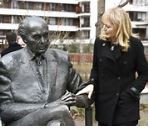 One of the daughters of the politician Katrina Lantos Swett touches the statue of her father, late US Congressman of Hungarian origin Tom Lantos during the unveiling ceremony near Lantos’ former school, Berzsenyi Daniel Secondary School, in Tom Lantos Walk in Budapest, Hungary, Thursday, Feb. 1, 2018. (Noemi Bruzak/MTI via AP) (Associated Press)