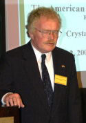 Rev. Imre Bertalan. Jr. delivering the invocation at a 2005 Board meeting of the American Hungarian Federation.